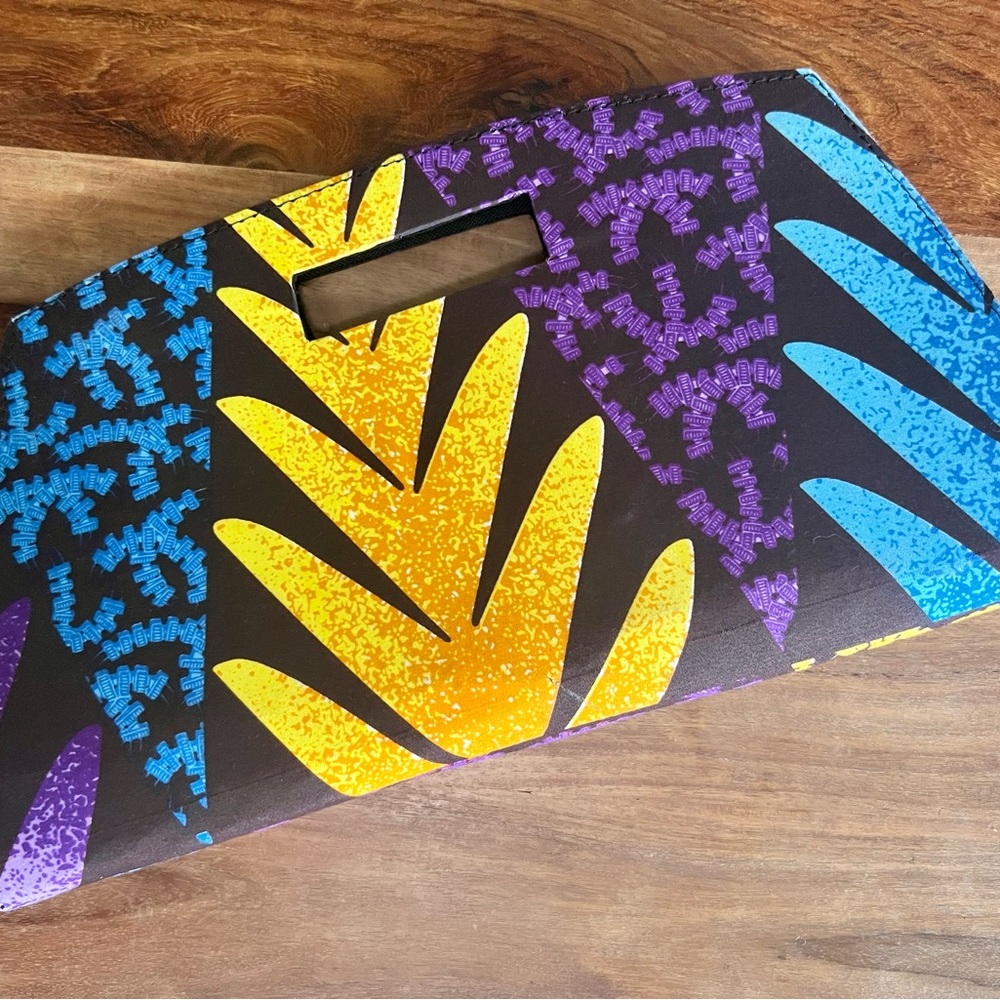 Handmade artisan clutch purse with global print design